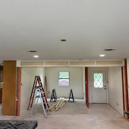 Finished open floor plan after wall removal