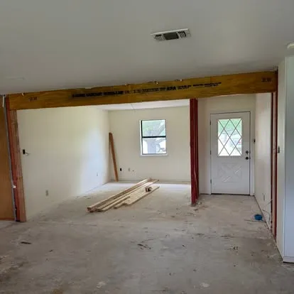 Header beam installed across the new opening
